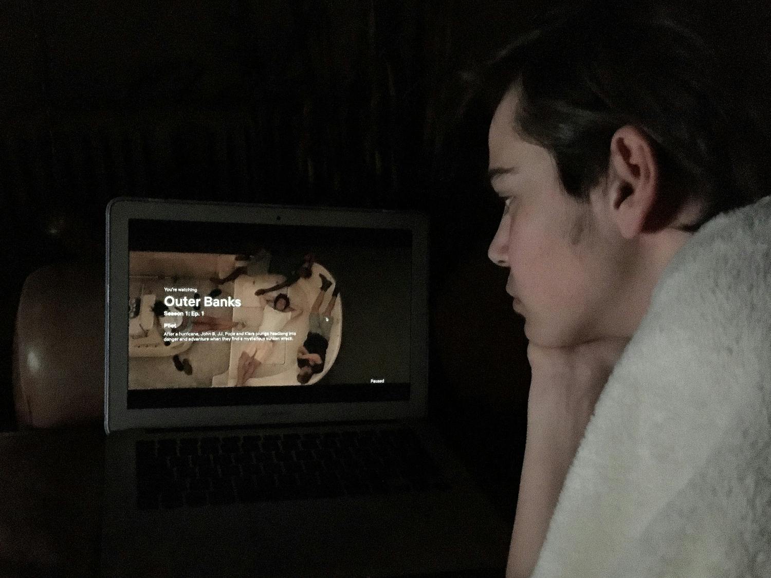 A student watches the Netflix show "Outer Banks" on his computer on Monday, May 18, 2020. This hit show, created by two UNC alumni, was released on April 15 and has since risen to the top of Netflix TV ratings.