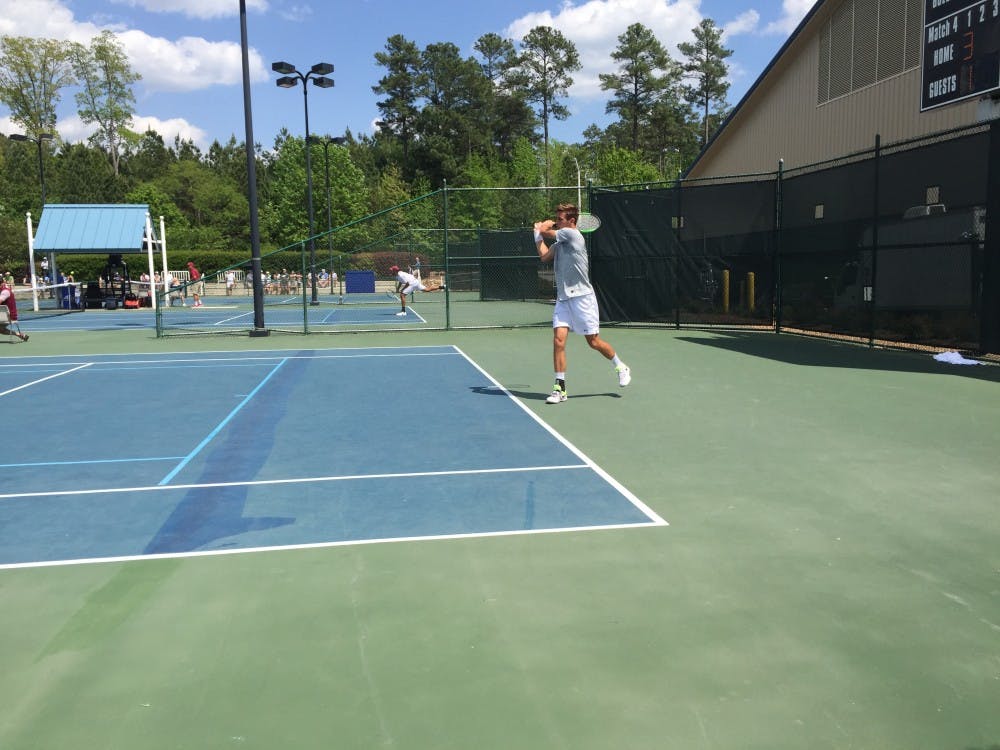 <p>First-year Benjamin Sigouin competes in the ACC Tournament semifinals against Florida State on April 28 at Cary Tennis Park.</p>