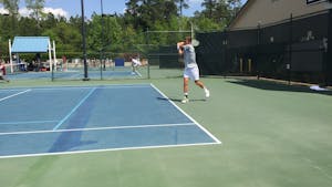First-year Benjamin Sigouin competes in the ACC Tournament semifinals against Florida State on April 28 at Cary Tennis Park.
