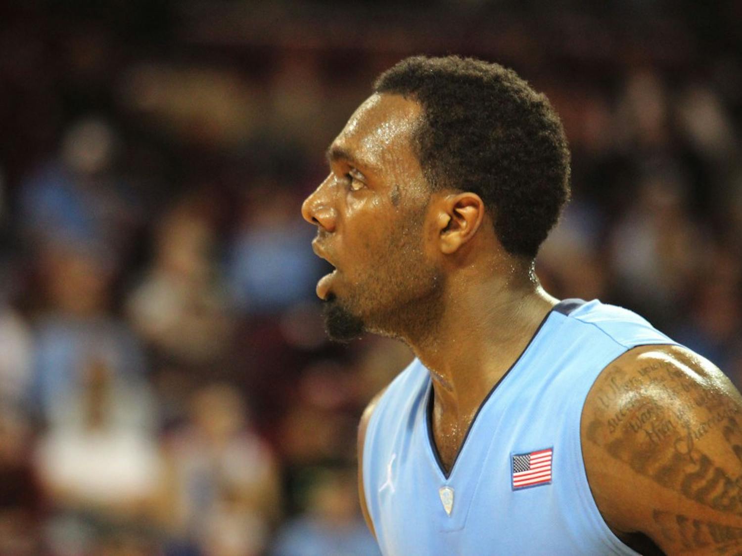 	P.J. Hairston looks on during the first half.