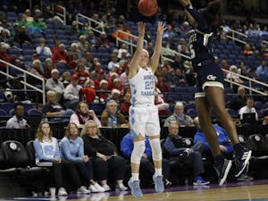 Sophomore guard Leah Church (20) takes a shot during UNC's first game in the ACC tournament against Georgia Tech in Greensboro, N.C. on Thursday, March 7, 2019. UNC defeated the Yellow Jackets 80-73 to move on to the next round of the tournament.&nbsp;