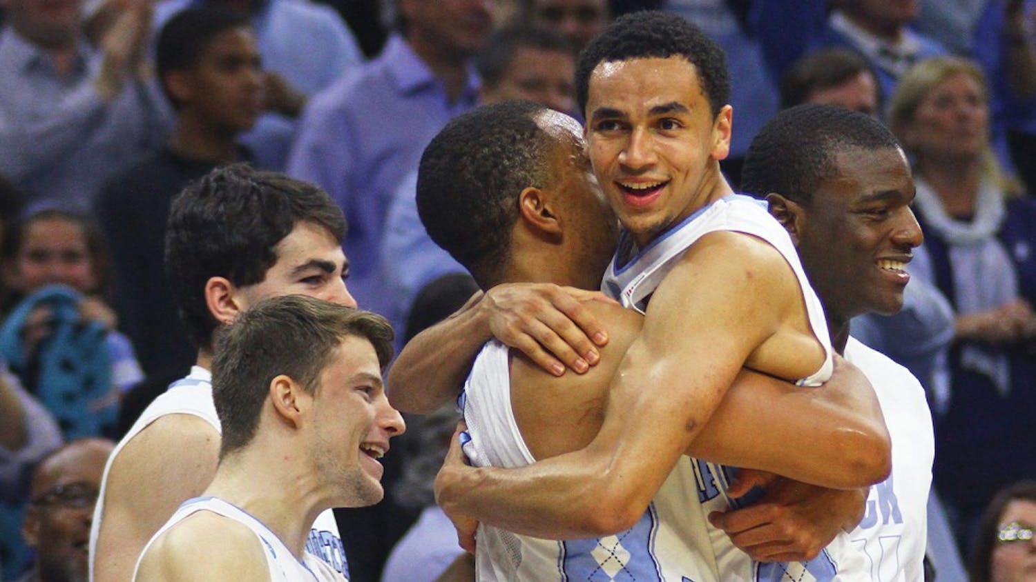North Carolina seniors Brice Johnson (left) &nbsp;and Marcus Paige (right) embrace after winning a spot into the Final Four by defeating Notre Dame 88-74 at the Wells Fargo Center in Philadelphia.&nbsp;