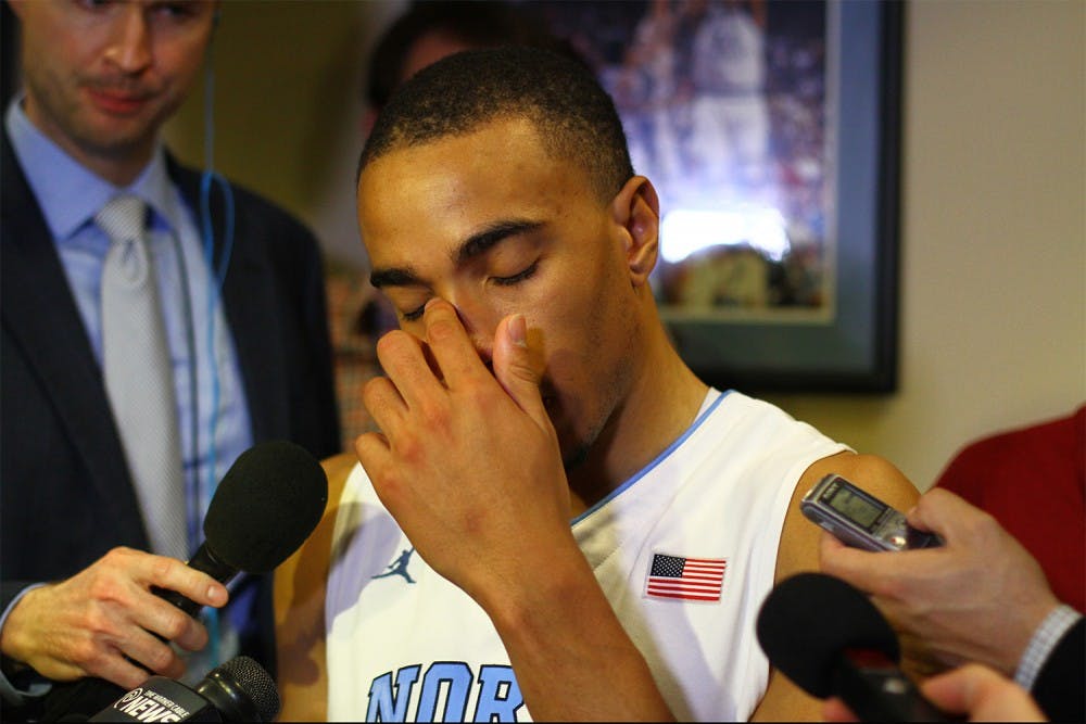 Senior forward Brice Johnson (11) answers questions during a press conference after the Tar Heels lost to Duke 74-73.