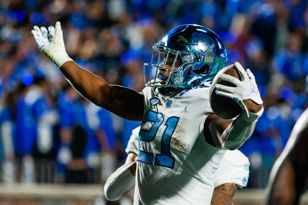UNC sophomore running back, Elijah Green (21), celebrates his second touchdown of the night in Wallace Wade Stadium on Oct. 15, 2022, in UNC’s faceoff against Duke. UNC won 38-35.
