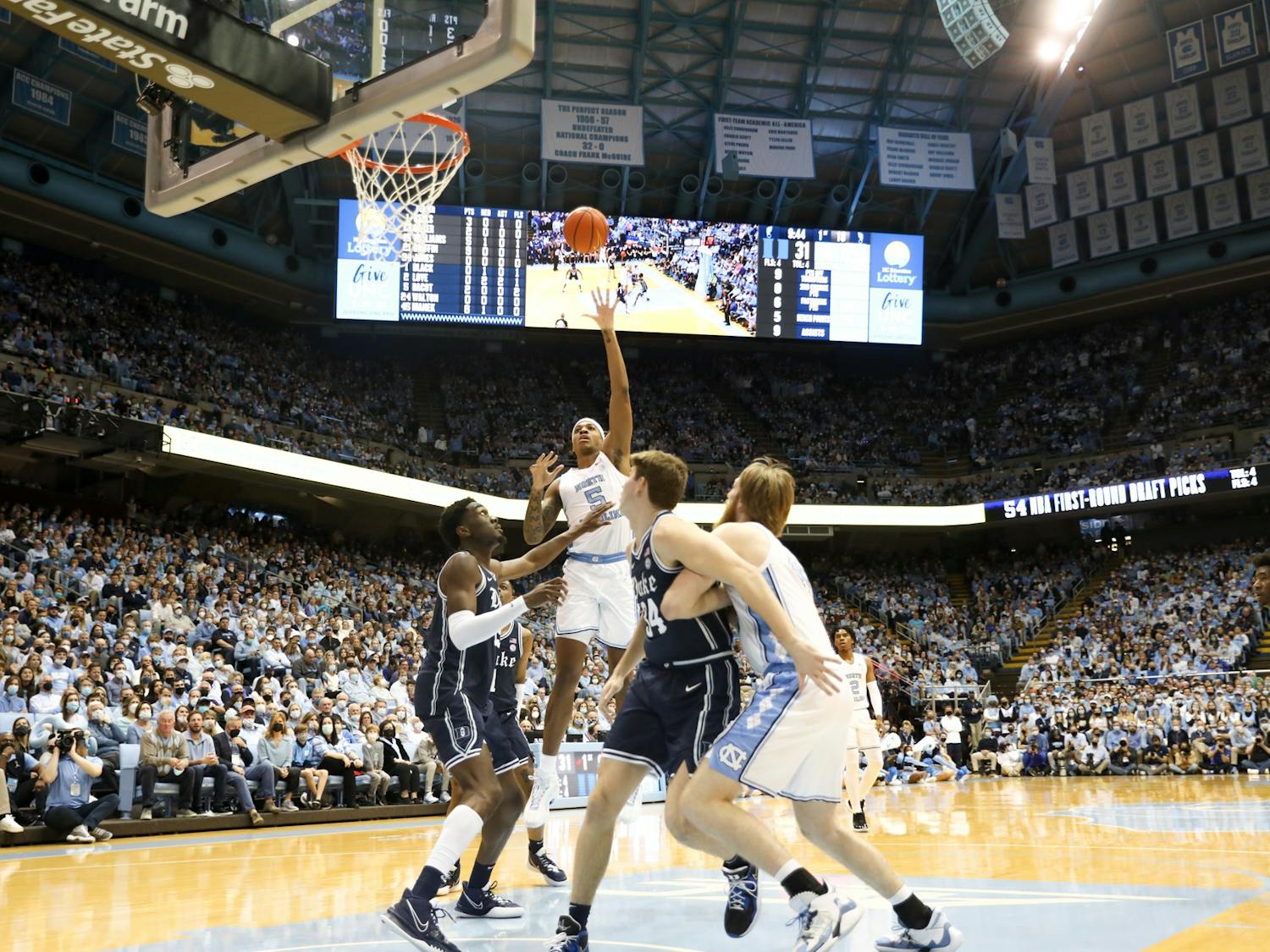 UNC junior forward Armando Bacot (5) puts up a shot from the paint during a UNC men's basketball game against Duke in the Dean Smith Center on Saturday, Feb. 5, 2022. Duke won 87-67.