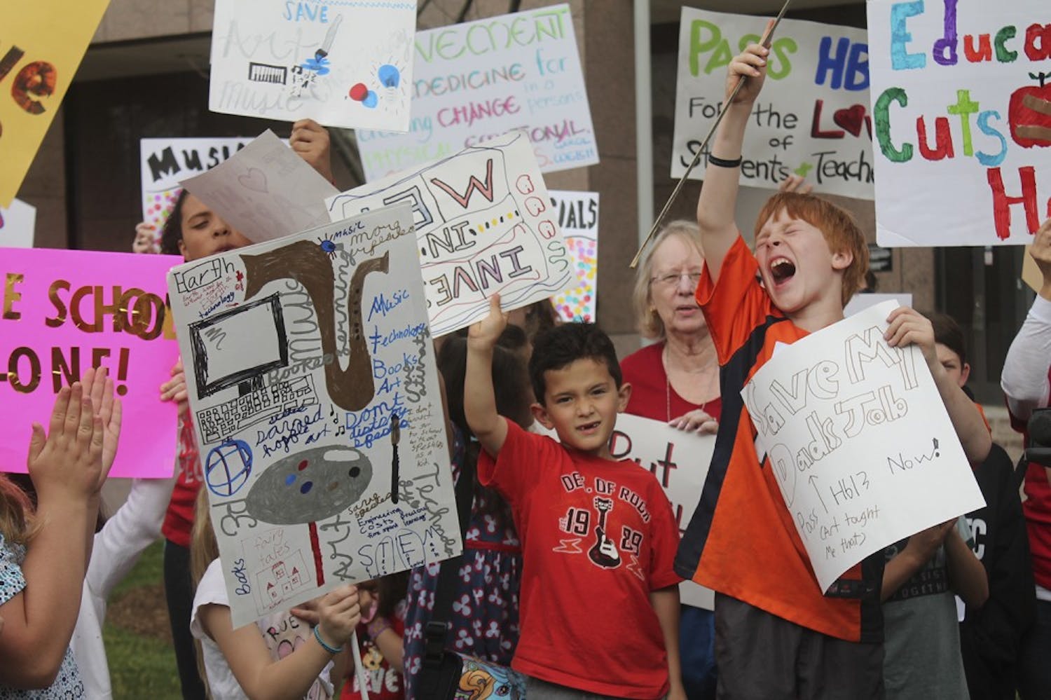 Public school children exhort passing the HB13 bill during a protest in Raleigh