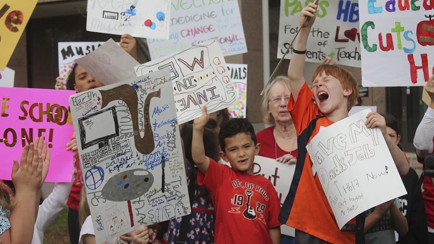 Public school children exhort passing the HB13 bill during a protest in Raleigh