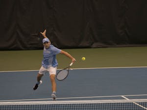 UNC sophomore Brian Cernoch hits the ball during a singles match against Illinois on Saturday, Feb. 1, 2020 at the Cone-Kenfield Tennis Center. UNC beat Illinois 4-0.