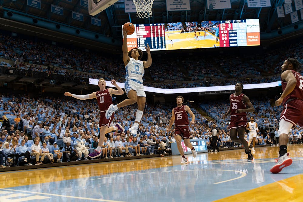 UNC first-year guard Seth Trimble makes a layup during the game against College of Charleston on Friday, Nov. 11, 2022, at the Dean Smith Center. UNC beat College of Charleston 102-86.