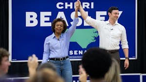 North Carolina Democratic U.S. Senate candidate Cheri Beasley on stage with Sen. Jon Ossoff (D-GA) during her rally at Fetzer Gym, on Oct. 16, 2022.