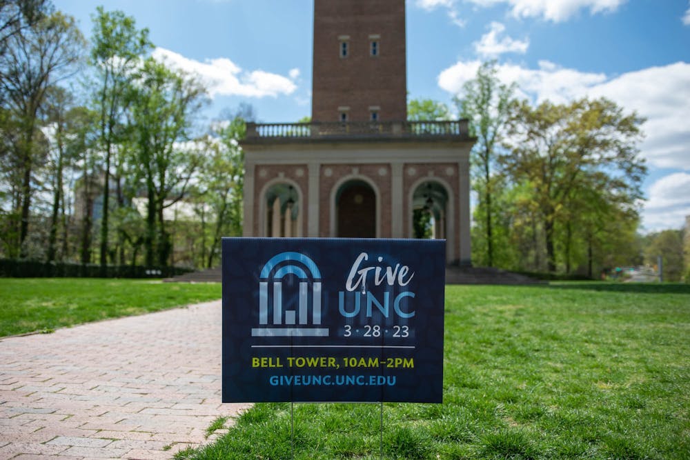 <p>A sign promoting GiveUNC by the Bell Tower on Wednesday, March 29, 2023.</p>