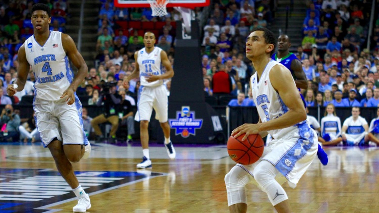 Marcus Paige winds up for a three-point shot.