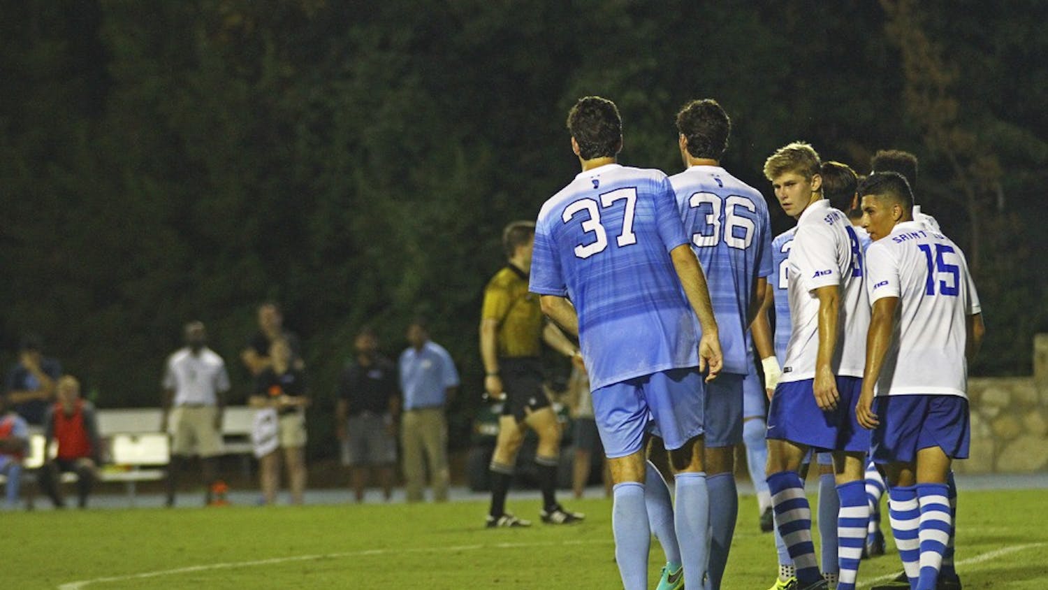 Redshirt seniors Walker and Tucker Hume line up for a free kick against St. Louis. The twins, from San Angelo, Texas, played their first game together for UNC against Cal Poly.