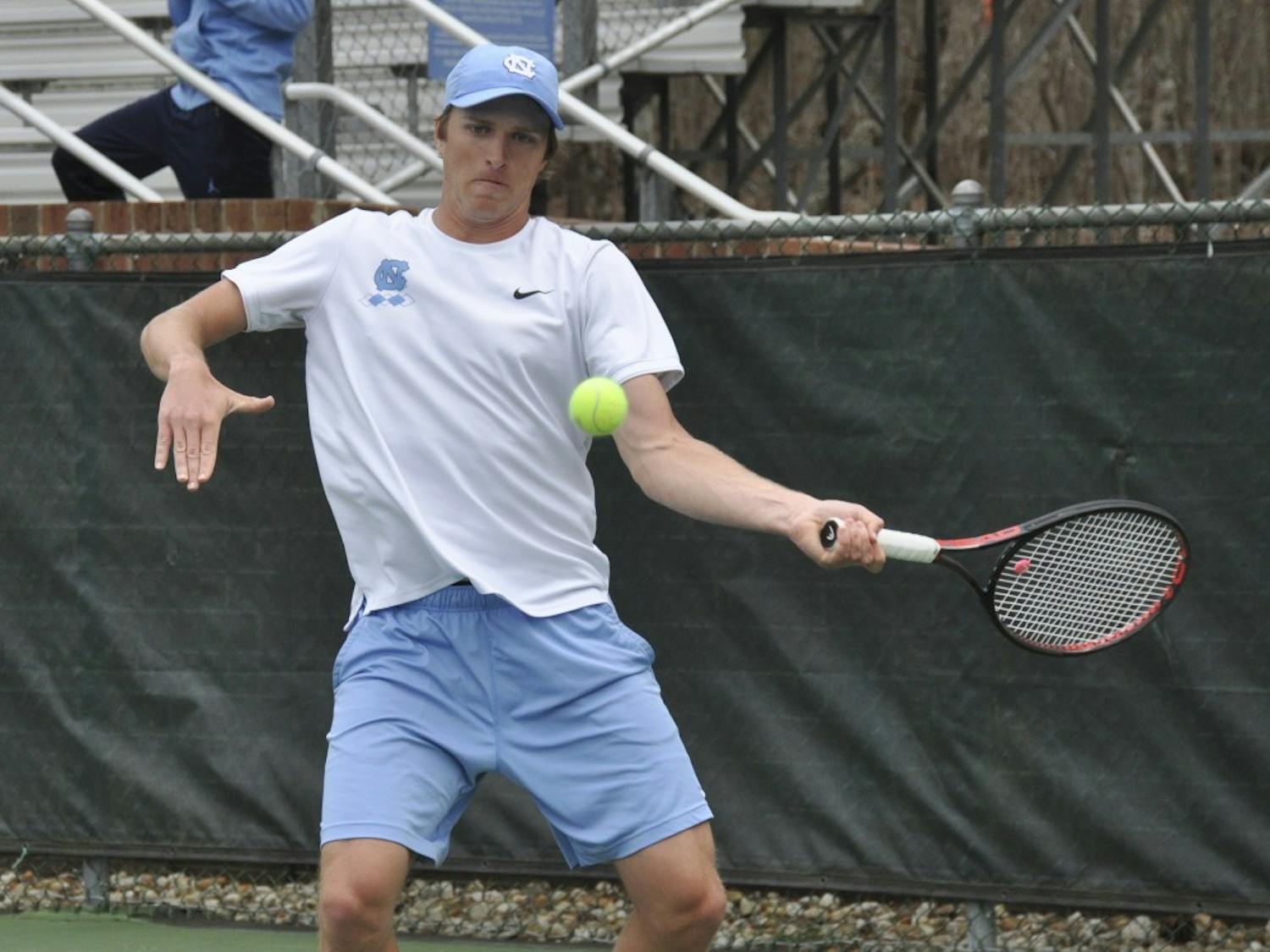 First-year Brian Cernoch hits a forehand during UNC's match against Florida State on Sunday, March 31, 2019. The Heels beat the Seminoles 6-1.