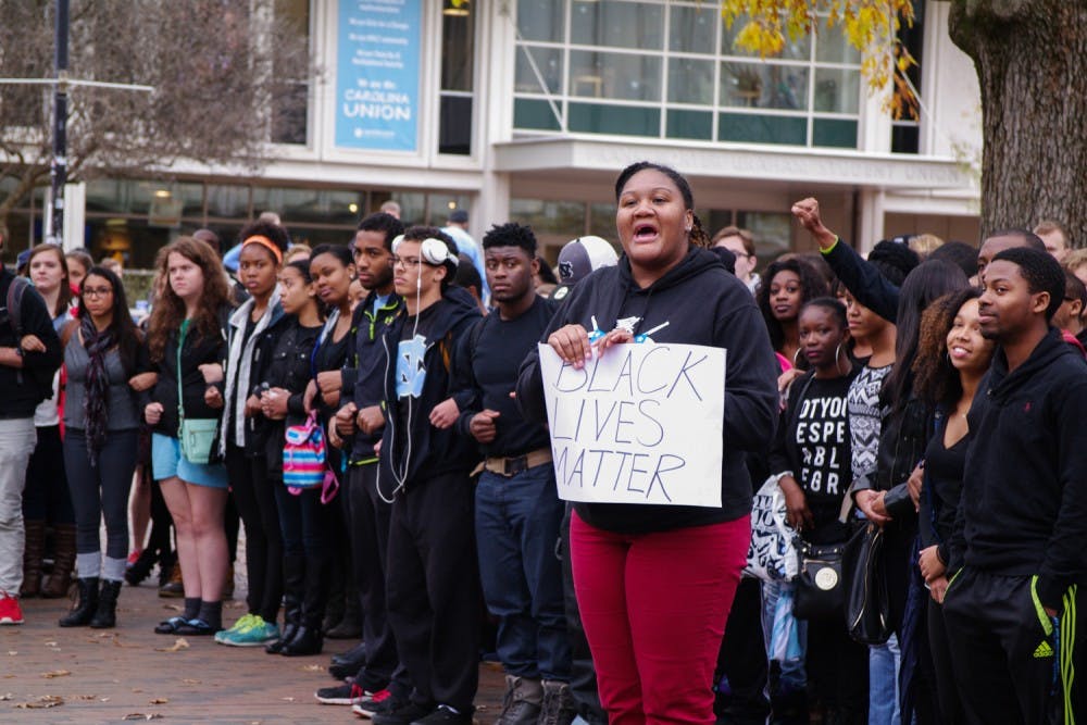 More than 600 students participated in UNC Silent Walk-Out in the Pit on Tuesday at noon. Mariah Monsanto planned the event. 