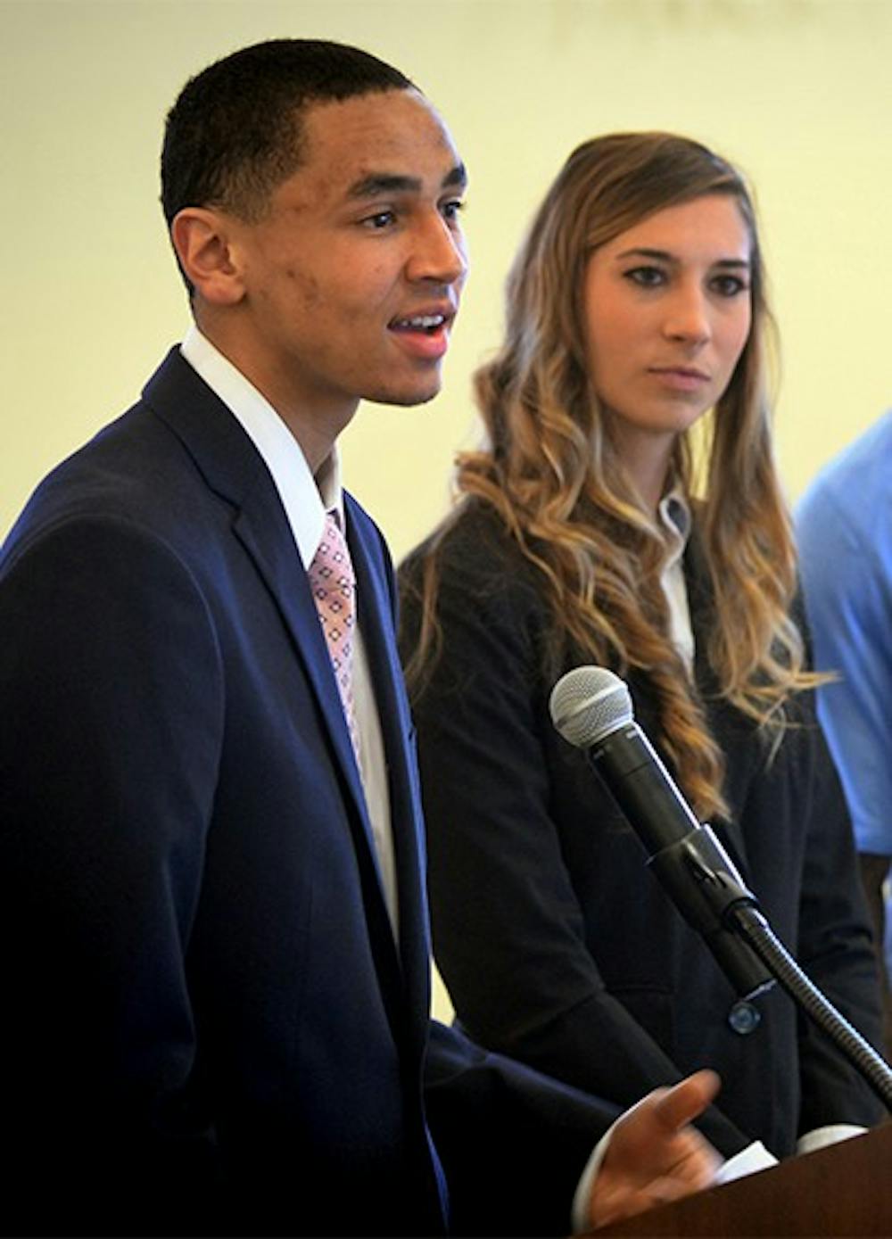 Student athlete Marcus Paige answers a question during the meeting of the Board of Trustees 3/27 at the University of North Carolina at Chapel Hill.  In background are Lori Spingola and Kemmi Pettway.