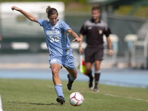 Tobin Heath was one of two Tar Heels representing Team USA in Tokyo. Heath is pictured preparing to pass the ball on Fetzer Field on September 7, 2008. Photo Courtesy of UNC Athletic Communications. 