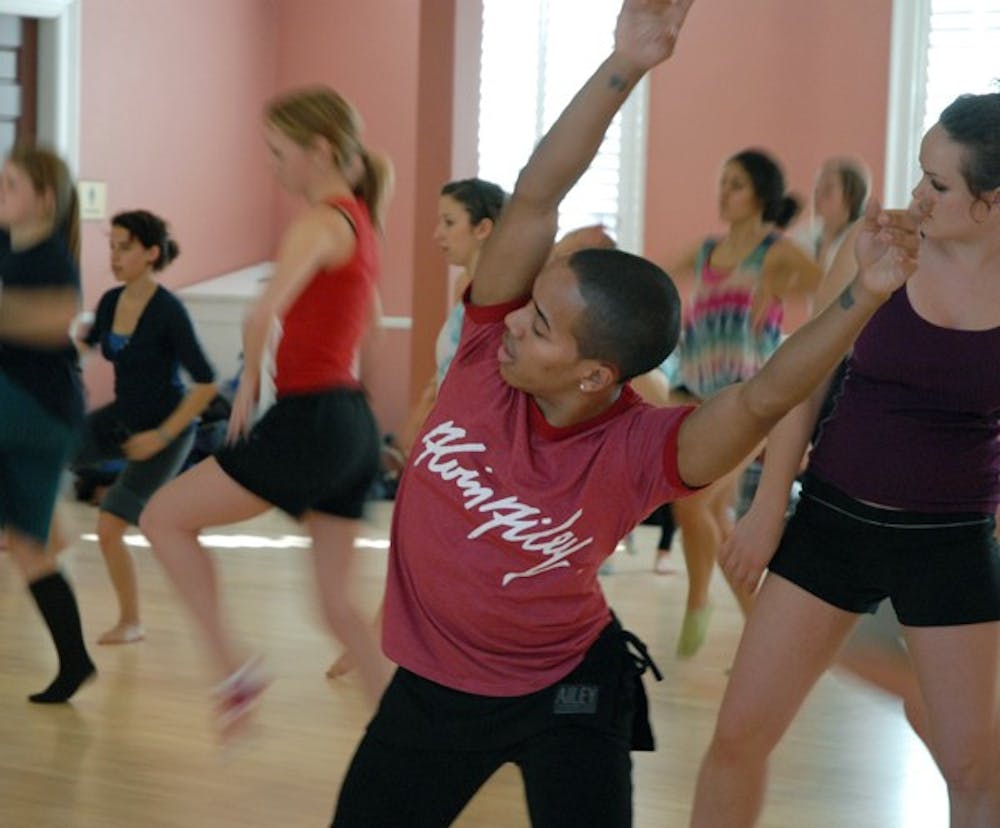 Daniel Harder, instructor of the Alvin Ailey II dance company, leads a group of dancers at UNC’s Gerrard Hall. DTH/Lauren Vied