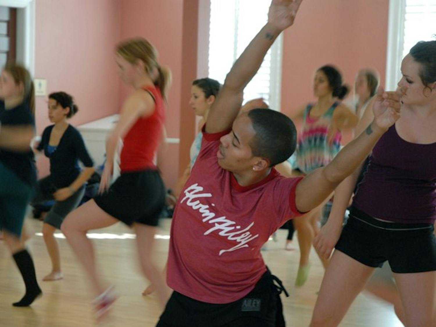 Daniel Harder, instructor of the Alvin Ailey II dance company, leads a group of dancers at UNC’s Gerrard Hall. DTH/Lauren Vied