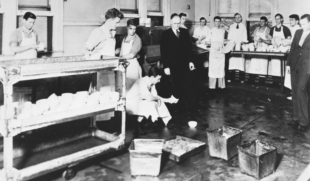 	<p>In 1931, <span class="caps">UNC</span> students washed dishes in the school dining halls for 25 cents per hour during the Great Depression to help pay for tuition. Photo courtesy of The North Carolina Collection, University of North Carolina library at Chapel Hill.</p>