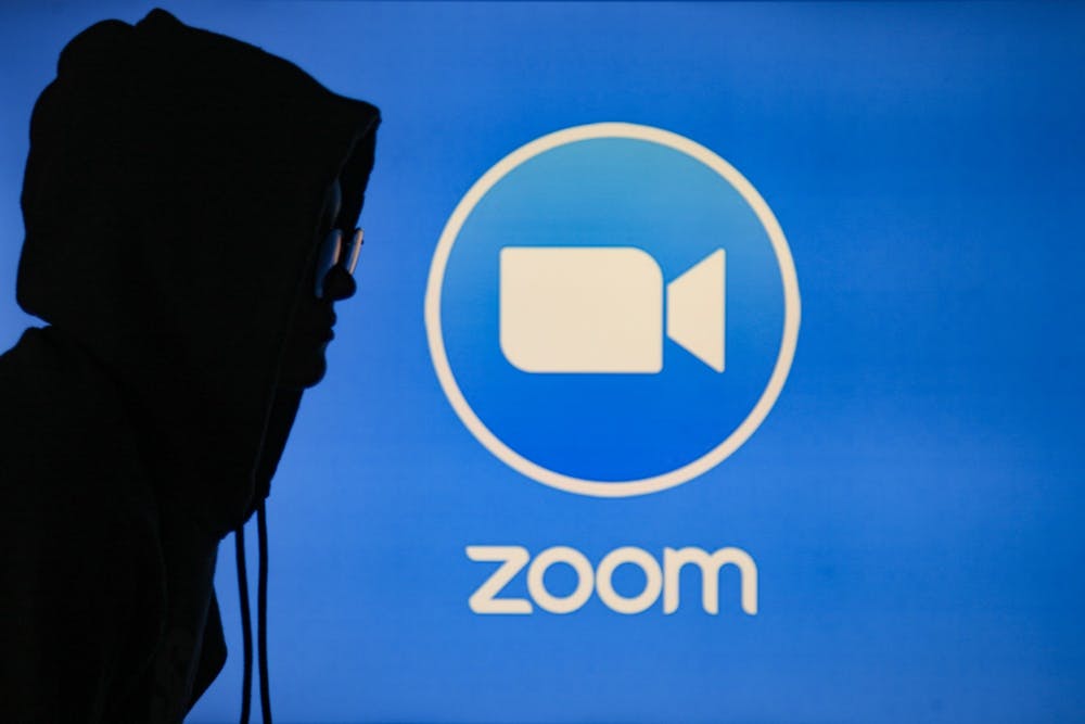 <p>DTH Photo Illustration. With the virtual meeting platform Zoom becoming more widely used, many participants are having to grapple with 'Zoombombers', or uninvited users who intend to disrupt meetings and events. One such event was a virtual law enforcement transformation town hall hosted by the Northern Orange NAACP on Sunday, July 26, 2020.&nbsp;</p>