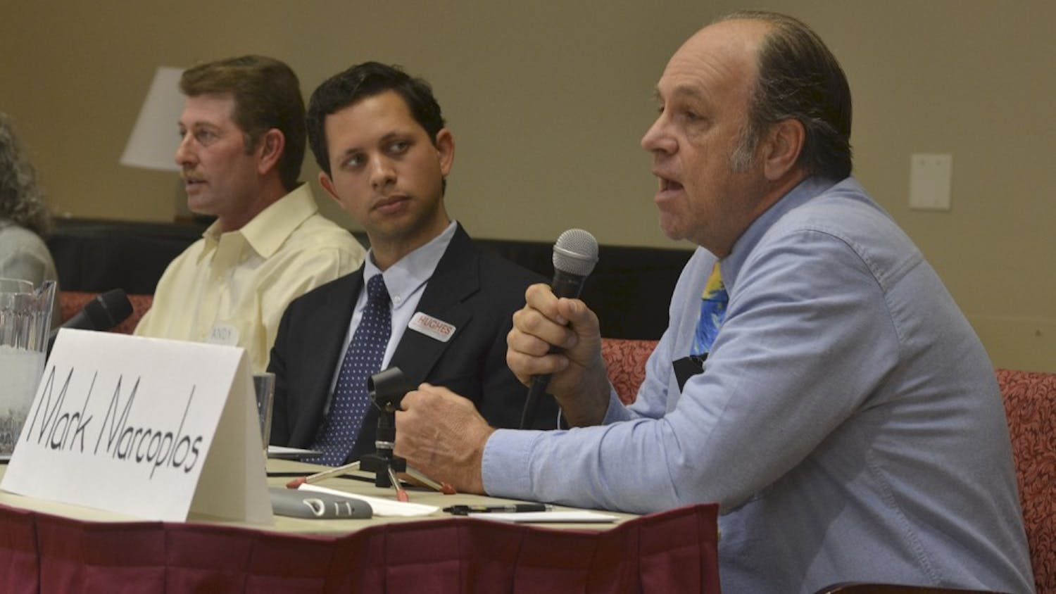 Marc Marcoplos responds to a question posed by a member of the audience. Candidates for the Orange County Board of Commissioners spoke at a forum on Tuesday afternoon, March 1.