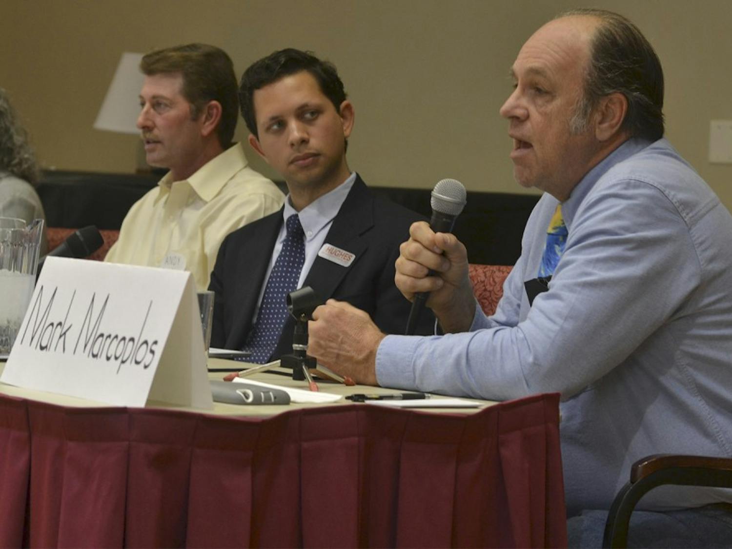 Marc Marcoplos responds to a question posed by a member of the audience. Candidates for the Orange County Board of Commissioners spoke at a forum on Tuesday afternoon, March 1.