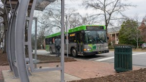 A GO Triangle bus stops at a bus stop on West Franklin Street in Chapel Hill on Wednesday, Feb. 16, 2022.