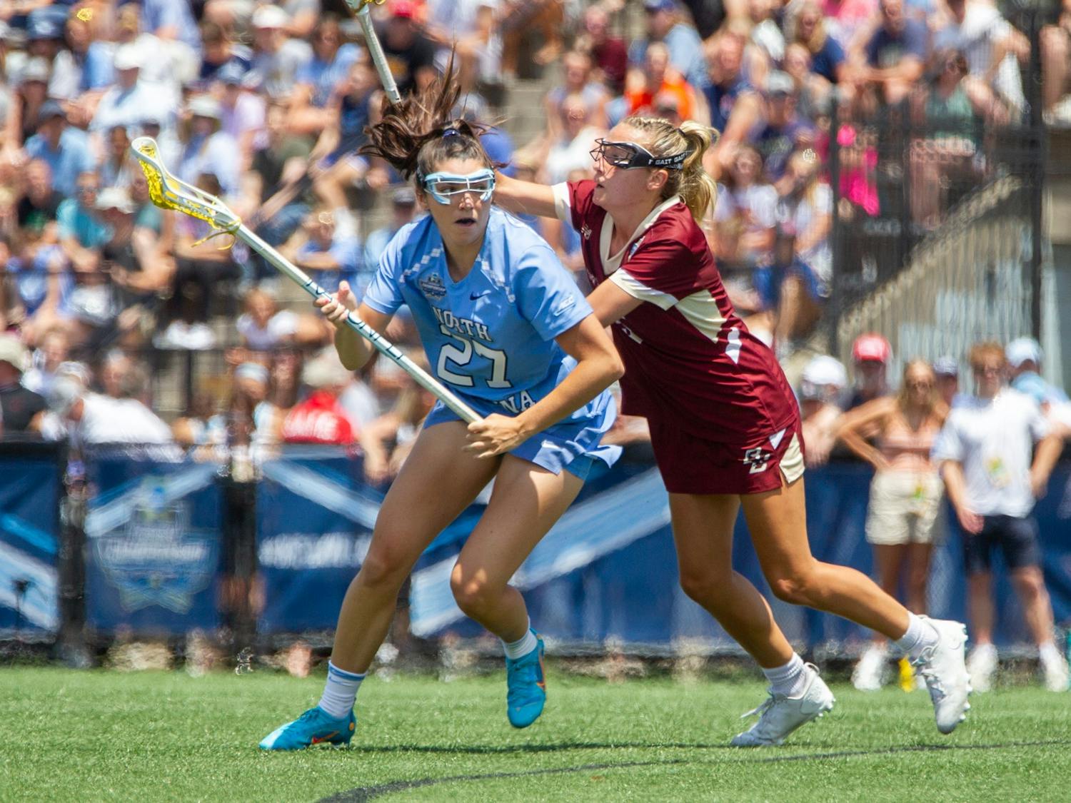 Junior midfielder Olivia Dirks (27) cradles the ball during UNC's NCAA Tournament Championship Final against Boston College at Homewood Field in Baltimore, Md. on Sunday, May 29, 2022. UNC won 12-11.