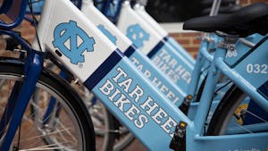 The "Tar Heels Bikes" bike share program was launched by Chancellor Folt and Associate Vice Chancellor of Campus Enterprises Brad Ives in front of Davis Library on Wednesday.