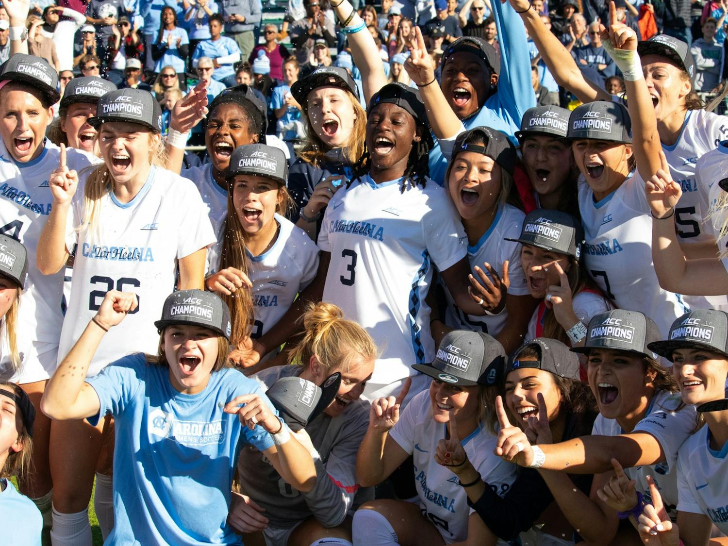 The UNC Women's Soccer team celebrate their ACC Championship win over Virginia at WakeMed Soccer Park on Sunday, Nov. 10, 2019. UNC won the game 2-1, after entering two overtimes. 