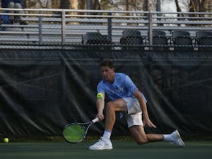UNC men's tennis senior Blaine "Bo" Boyden prepares to return the ball during a singles match against NC State on Wednesday April 3, 2019. UNC beat NC State 4-0.&nbsp;
