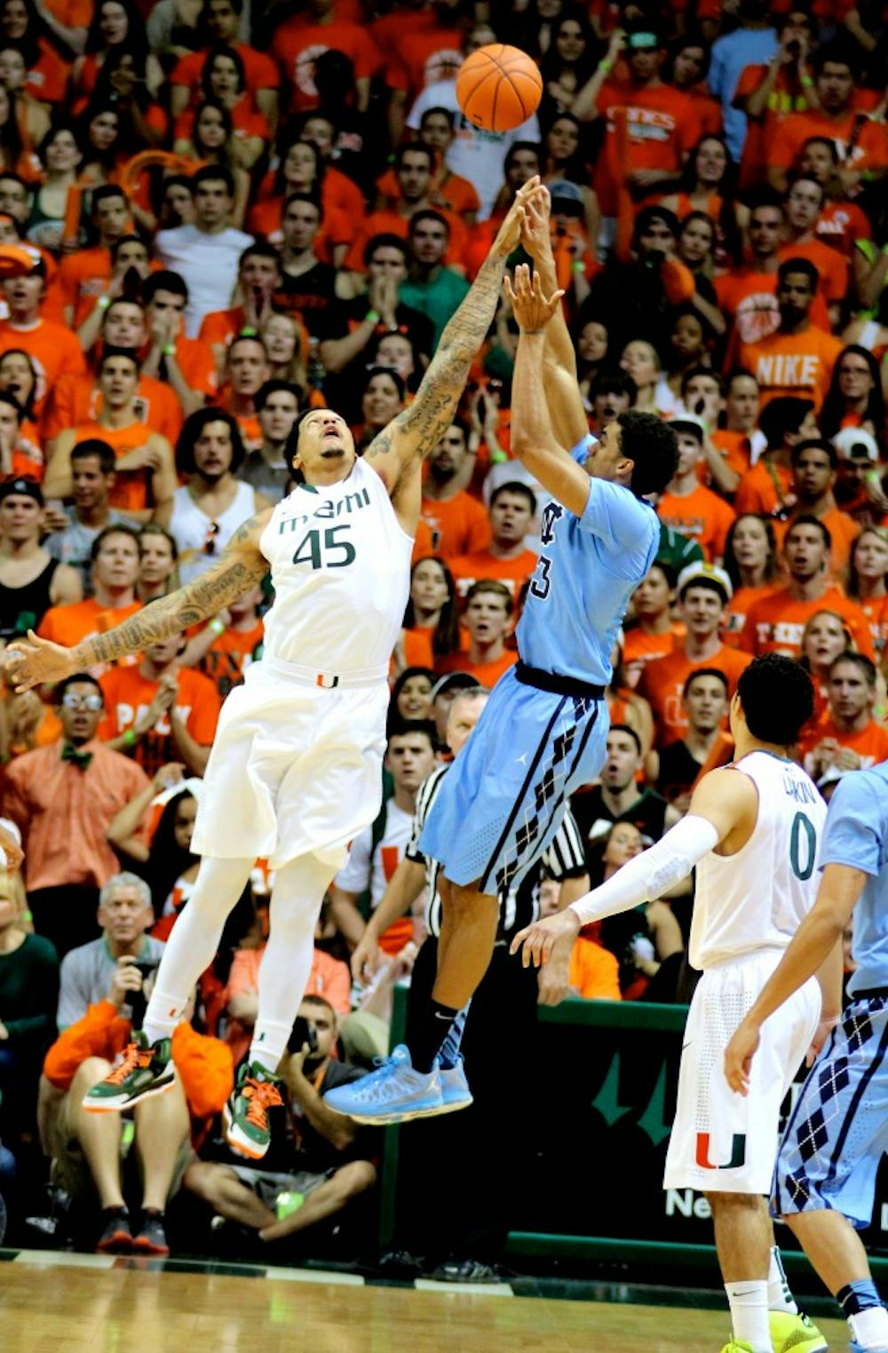 	Sophomore forward James Michael McAdoo goes up for a contested shot against Miami&#8217;s Julian Gamble. McAdoo finished with six points after shooting 3 of 12 from the floor. 