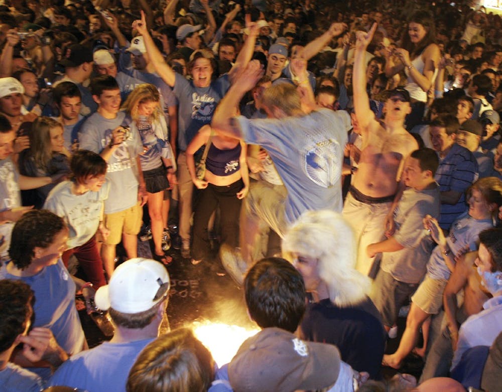 Fans celebrate Roy Williams' first championship win on Franklin Street. DTH/file