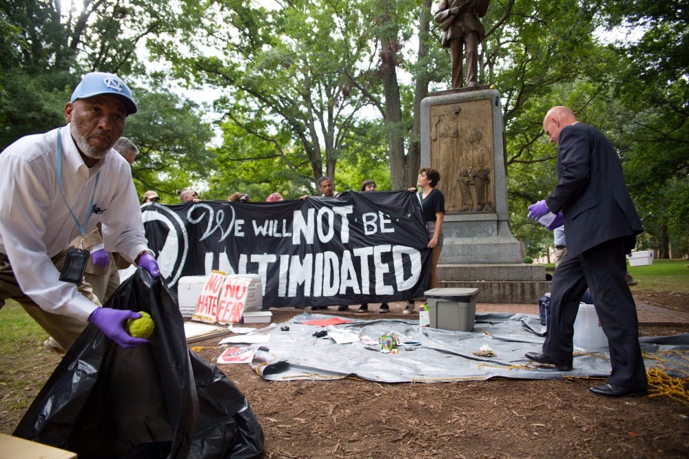 DPS came to McCorkle Place to vacate the immediate area surrounding the Silent Sam statue Aug. 31, 2017.&nbsp;