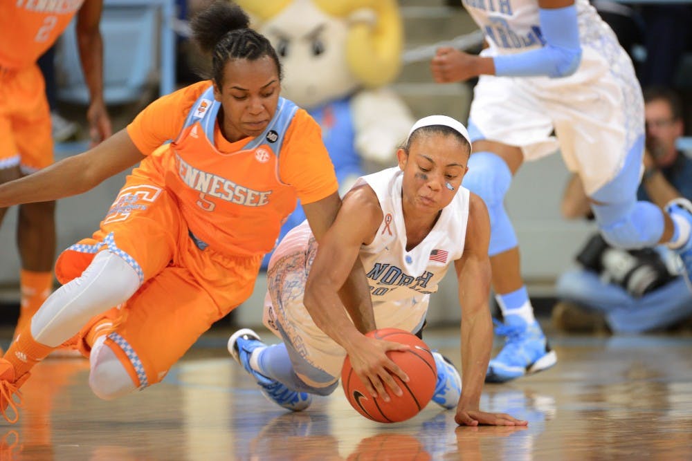 UNC guard Latifah Coleman (2) fights Tennessee guard Ariel Massengale (5) for possesion of a loose ball. 