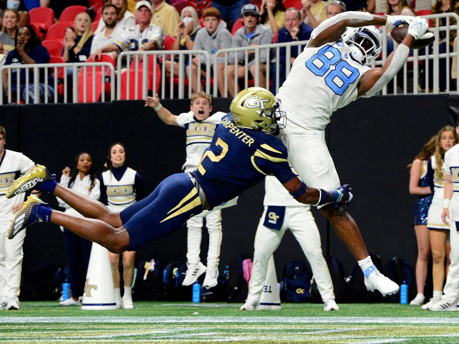 UNC sophomore tight end Kamari Morales (88) intercepts a long pass during the Tar Heels' away game against Georgia Tech in the Mercedes-Benz Stadium in Atlanta, GA, on Sept. 25, 2021. Photo Courtesy of UNC Athletic Communications. 