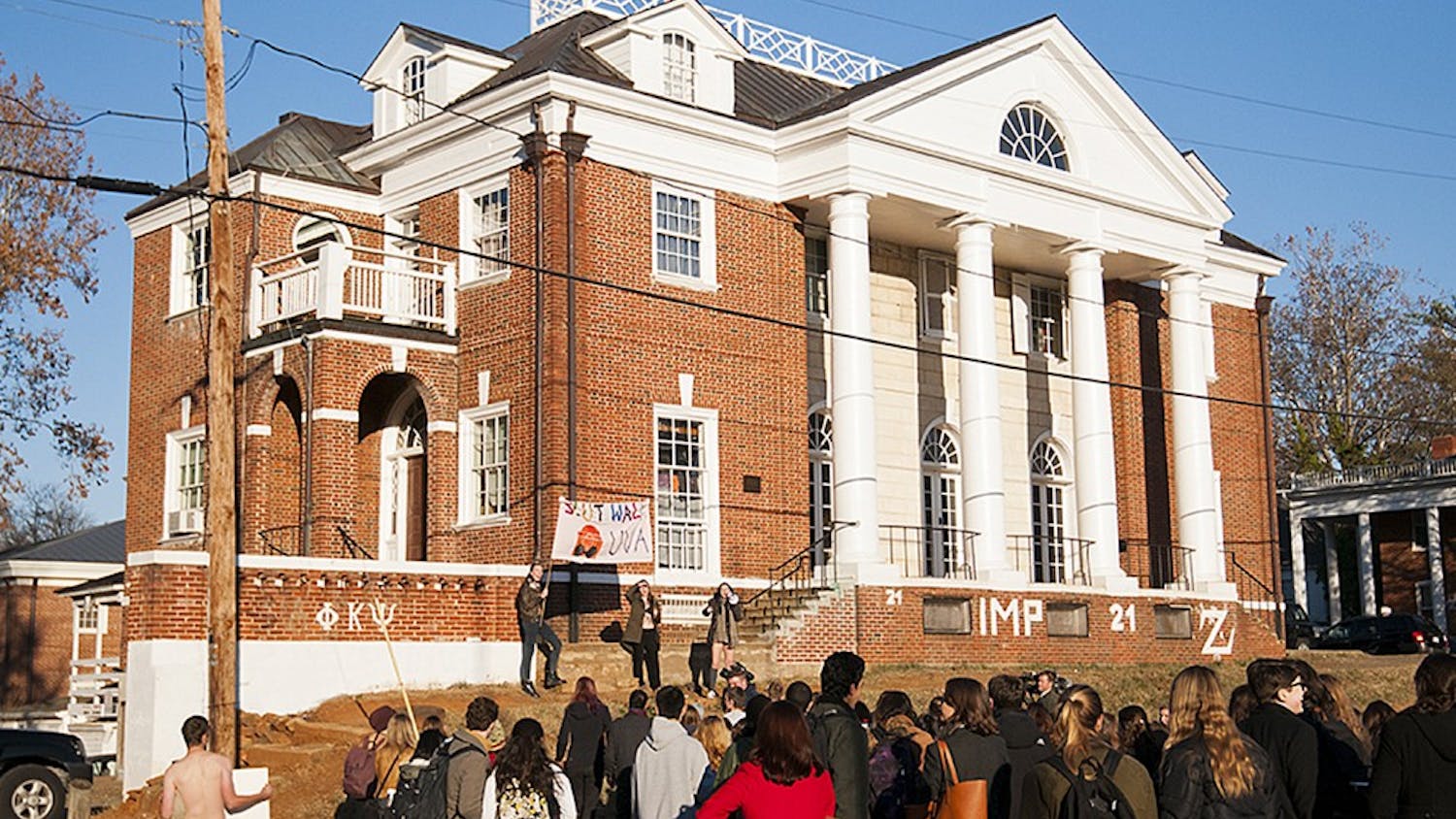 University of Virginia students gather outside the Phi Kappa Psi house to protest the fraternity following the release of the explosive Rolling Stone article “A Rape on Campus”  in November. Courtesy of the Cavalier Daily/Sarah MacAdam. 