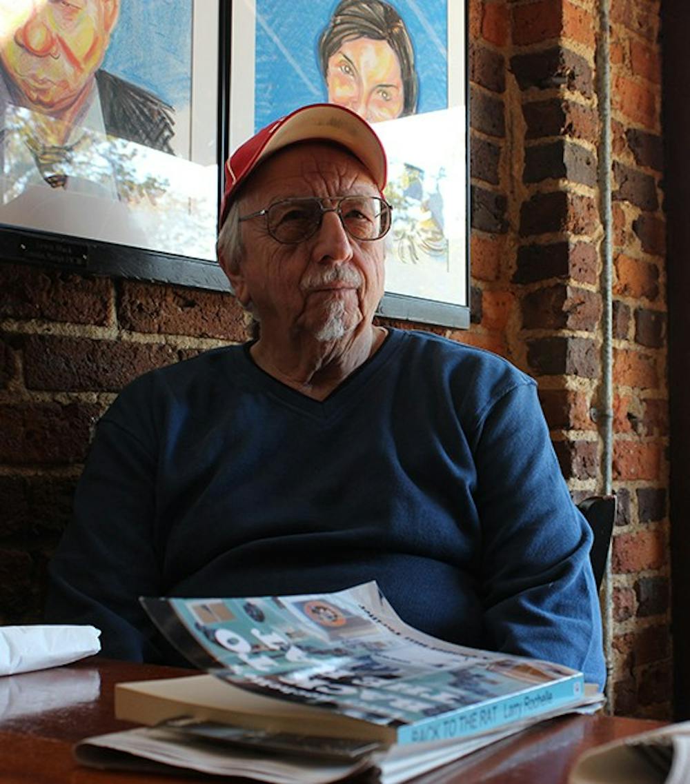 Larry Rochelle, author of "Back To the Rat," visits Spanky's restaurant on East Franklin Street where the action takes place in the book.