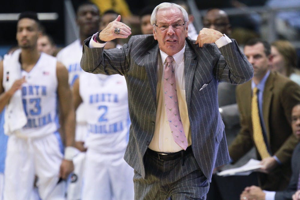 Roy Williams yells for a timeout. Williams would receive a technical foul on the play. 