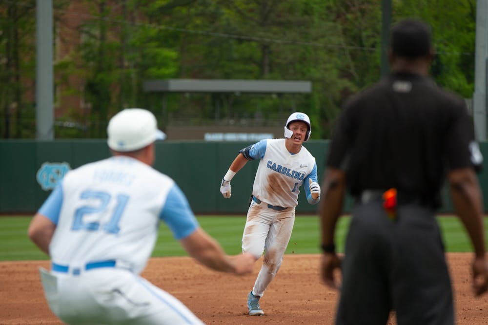 UNC junior shortstop Danny Serretti (1) runs to third base after hitting the ball out of the park during a baseball game against Georgia Tech at Boshamer Stadium on Saturday, April 16, 2022. UNC won 10-5.