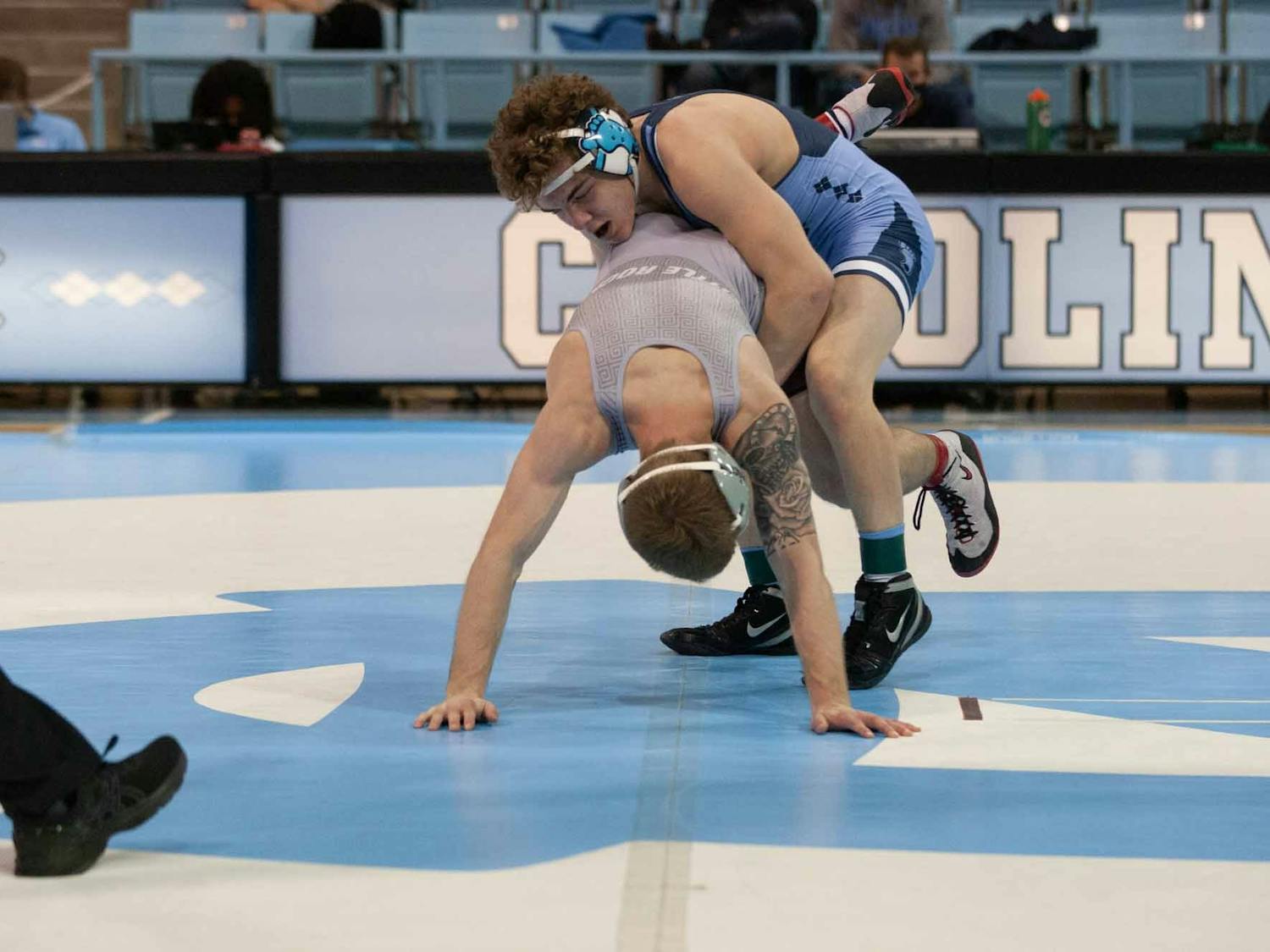 First-year Spencer Moore wrestles Little Rock's Aidan Campbell during a UNC wrestling meet on Sunday, Jan. 23, 2022, at Carmichael Arena. Moore defeated Campbell, 2-0.