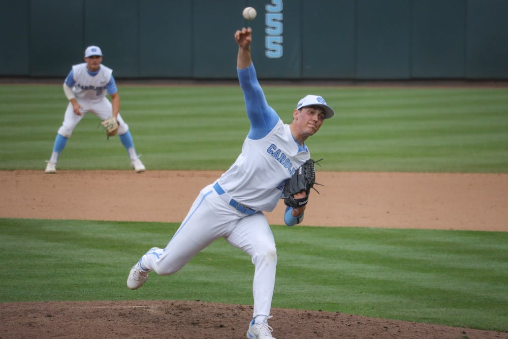 UNC senior pitcher Shawn Gage Gillian (15) pitches the ball during the Tar Heels' 1-6 loss against N.C. State on Saturday, March 27, 2021 in Boshamer Stadium in Chapel Hill, N.C.