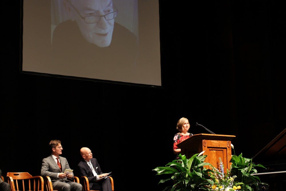 (From left to right) Federico Luisetti, former chancellor James Moeser and Alisa Eanes, former Covenant Scholar, offer their reflections during the memorial service for the late Fred Clark in Memorial Hall on Saturday. 
