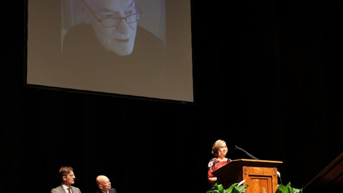 (From left to right) Federico Luisetti, former chancellor James Moeser and Alisa Eanes, former Covenant Scholar, offer their reflections during the memorial service for the late Fred Clark in Memorial Hall on Saturday. 