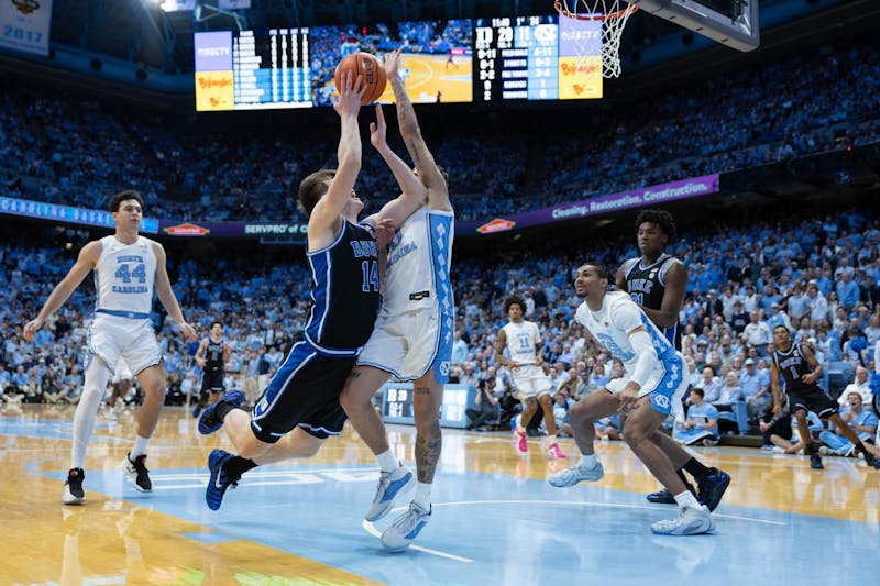 No. 14 UNC men's basketball defeats No. 4 Duke, 71-68, on last-second 3-pointer
