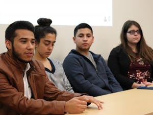 Michael Sosa (far left), UNC junior and president of Mi Pueblo, addresses the crowd at a forum on Thursday, Nov. 29 2018. The forum was held to discuss the need of a Latinx space on campus for the increasing Latinx population.