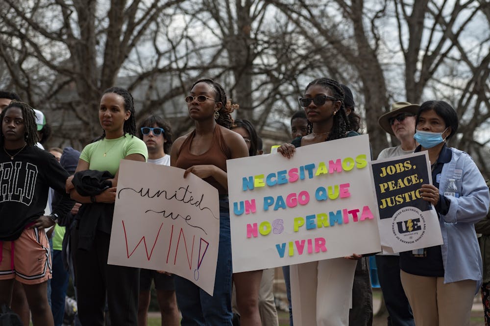 UNC students support Housekeepers movement for $20/hour at a protest outside of the South Building on Feb. 22, 2023.