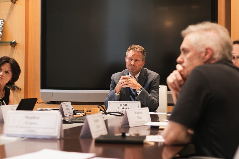 Interim Chancellor Kevin Guskiewicz hears from the Chancellor's Advisory Committee in the conference room of South Building in Chapel Hill on Tuesday, Sept. 24, 2019.