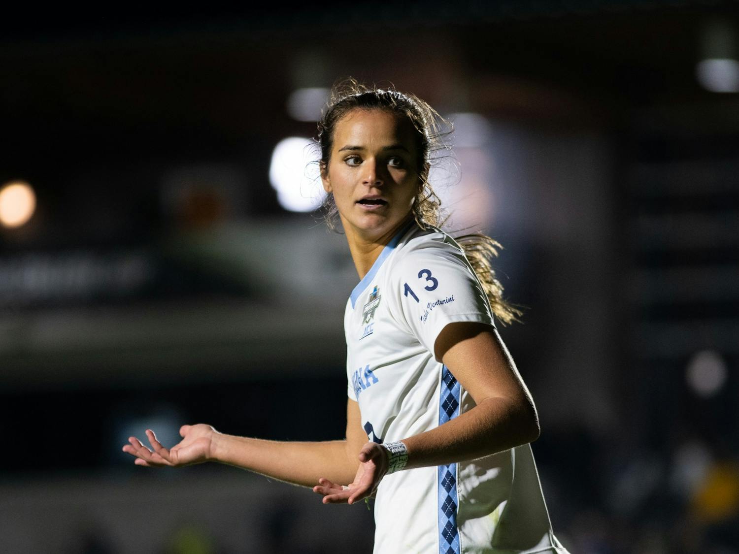 UNC senior forward Isabel Cox (13) questions a call during UNC's game against UCLA in the NCAA Finals at WakeMed Soccer Park on Friday, Dec. 5, 2022. UNC lost 3-2 in 2OT.